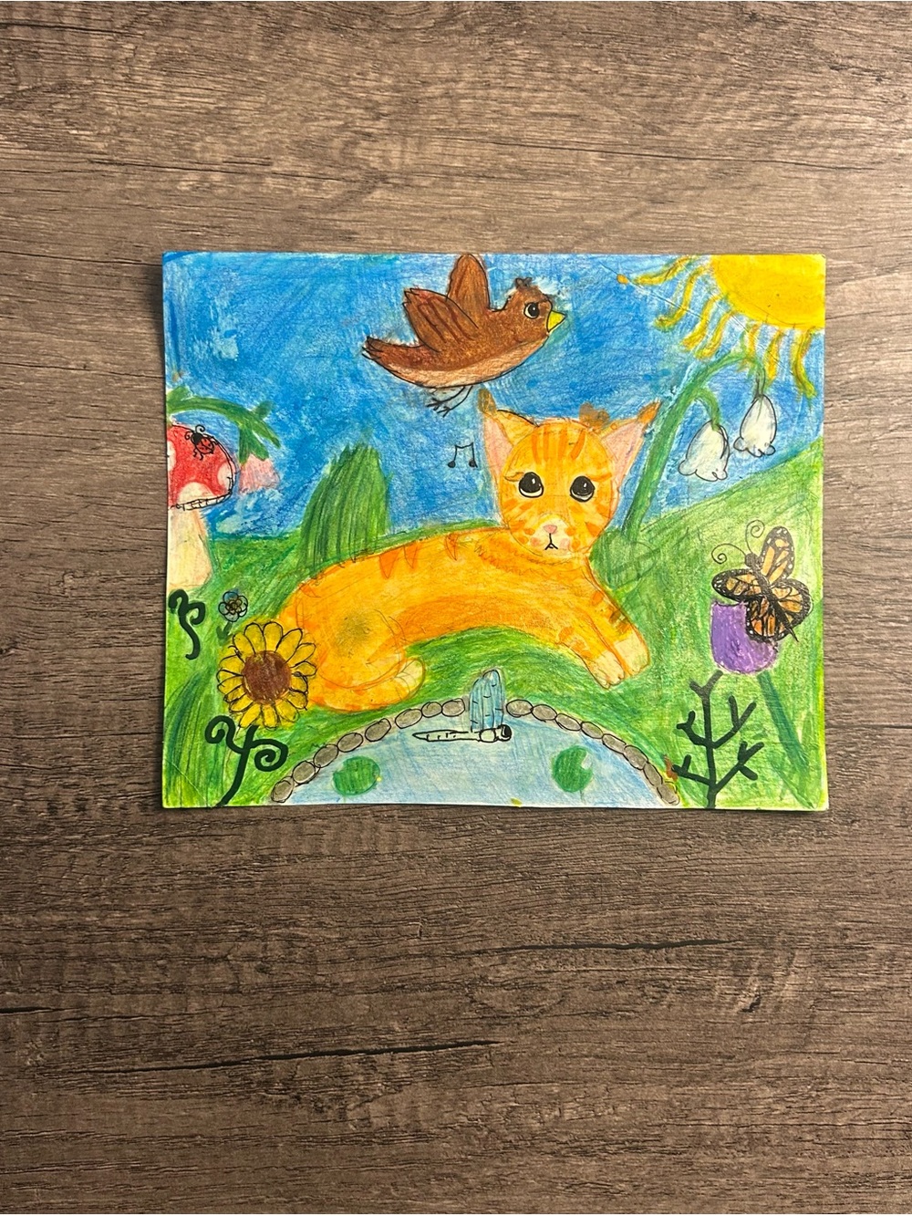 Handmade whimsical cat surrounded by forest life!